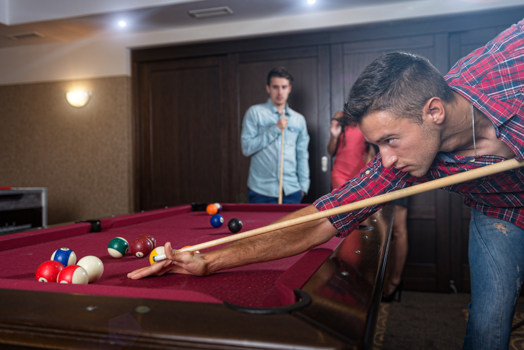 Fun with friends during playing billiard